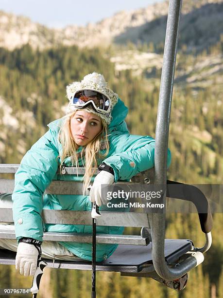 skier on a chairlift waiting for it to snow - mount disappointment stock pictures, royalty-free photos & images