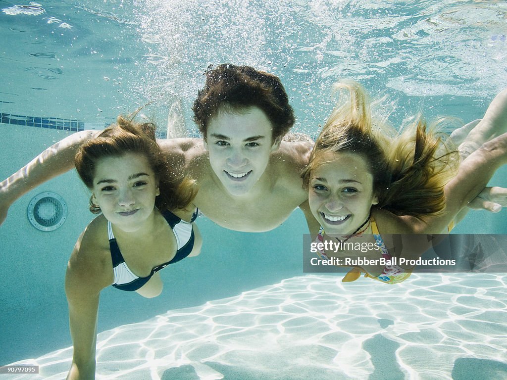 Teenagers in a swimming pool