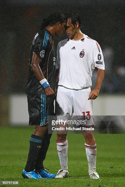 Brandao of Marseille squares up to Alessandro Nesta of Milan during the UEFA Champions League Group C match between Marseille and AC Milan at the...
