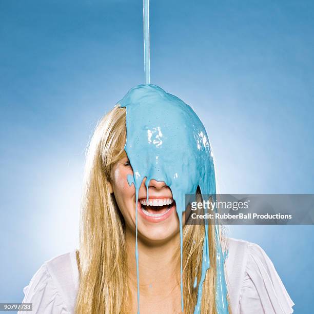 woman getting paint poured on her head - slime bildbanksfoton och bilder