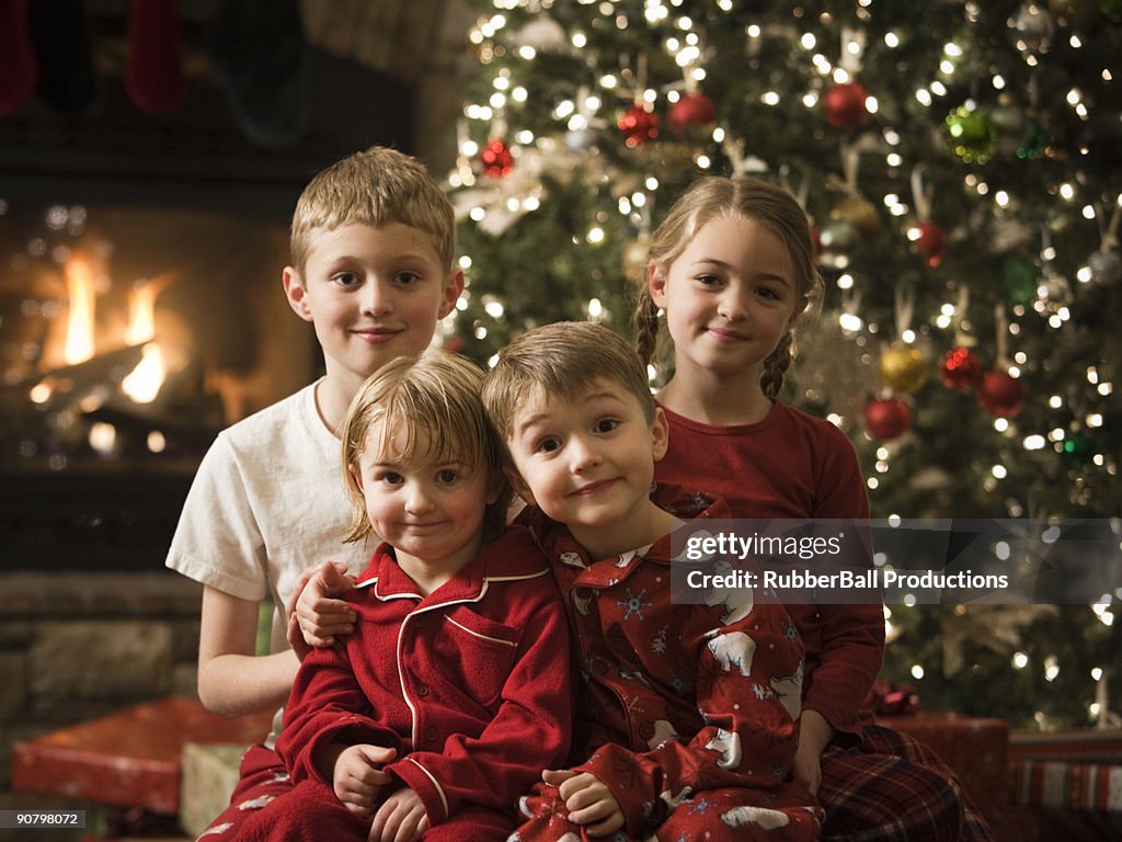 Four siblings at christmas