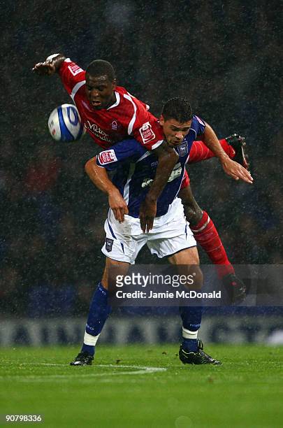 Jon Walters of Ipswich Town battles with Wes Morgan of Nottingham Forest during the Coca Cola Championship match between Ipswich Town and Nottingham...