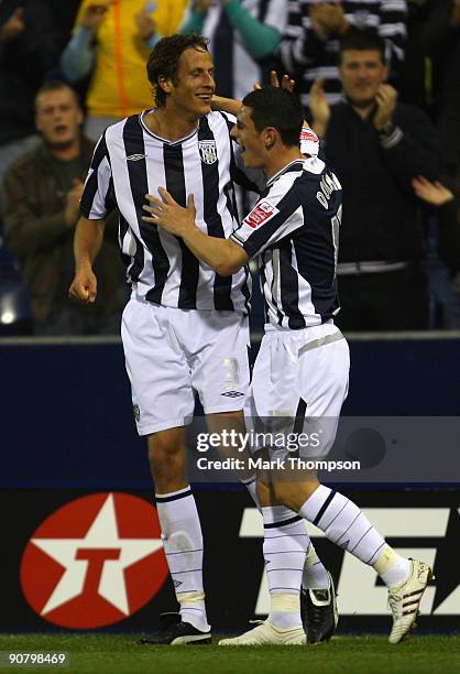 Jonas Olsson of West Bromwich Albion celebrates his goal with team mate Graham Dorrans during the Coca Cola Championship match between West Bromwich...