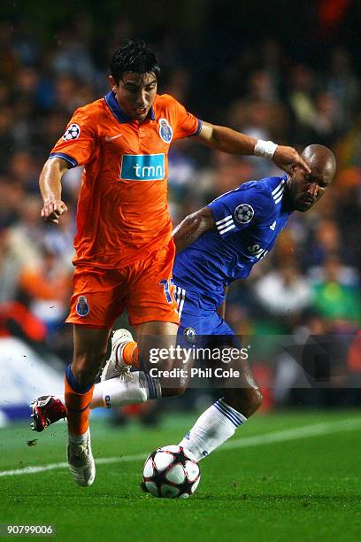 Fucile of Porto is challenged by Nicolas Anelka of Chelsea during the UEFA Champions League Group D match between Chelsea and FC Porto at Stamford...
