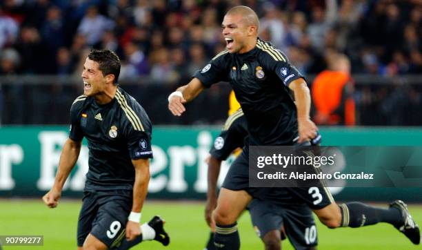 Cristiano Ronaldo and Pepe of Real Madrid celebrate a goal scored for their team during the UEFA Champions League Group C match between FC Zurich and...