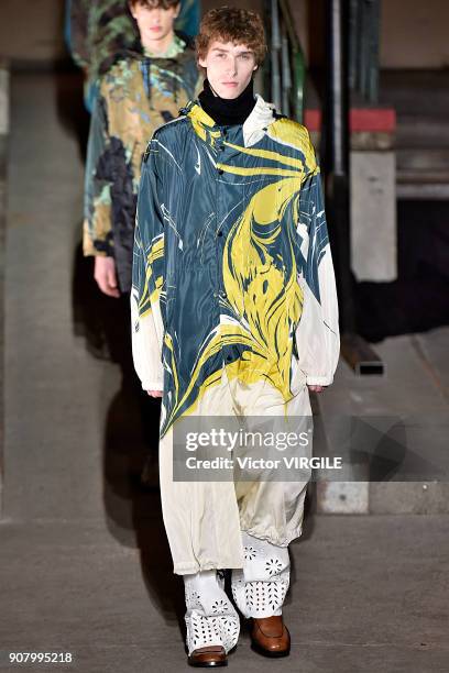 Model walks the runway during the Dries Van Noten Menswear Fall/Winter 2018-2019 show as part of Paris Fashion Week on January 18, 2018 in Paris,...