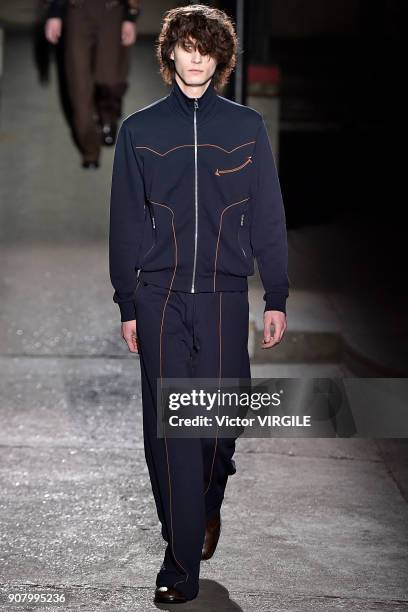 Model walks the runway during the Dries Van Noten Menswear Fall/Winter 2018-2019 show as part of Paris Fashion Week on January 18, 2018 in Paris,...