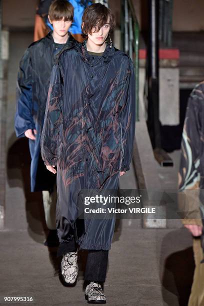 Model walks the runway during the Dries Van Noten Menswear Fall/Winter 2018-2019 show as part of Paris Fashion Week on January 18, 2018 in Paris,...