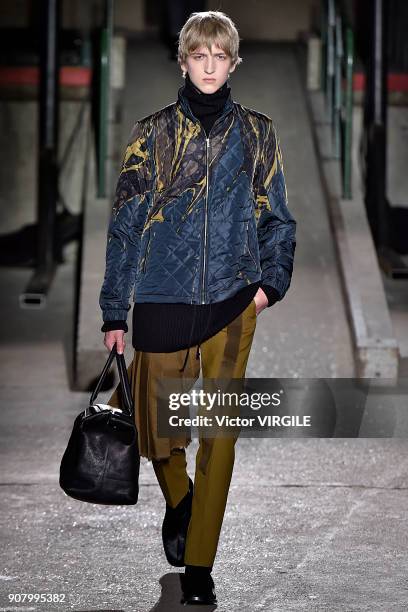 Model walks the runway during the Dries Van Noten Menswear Fall/Winter 2018-2019 show as part of Paris Fashion Week on January 18, 2018 in Paris,...