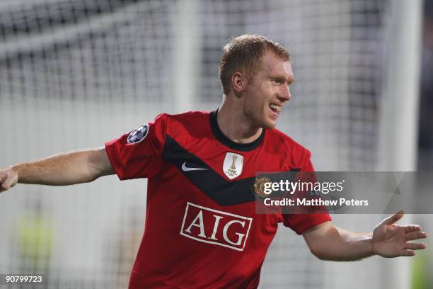 Paul Scholes of Manchester United celebrates scoring the opening goal of the UEFA Champions League match between Besiktas and Manchester United at...