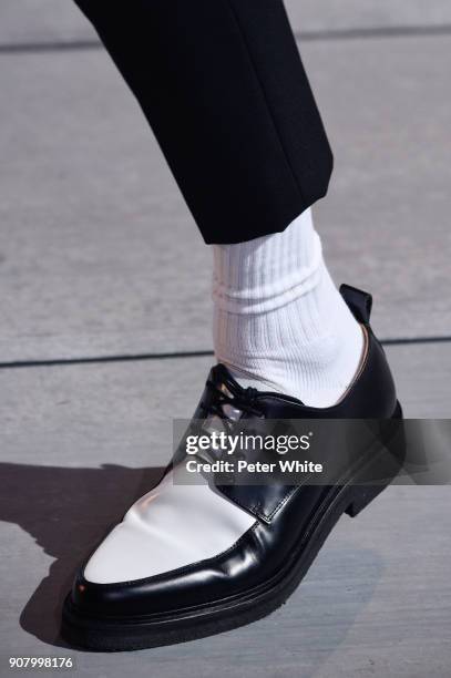 Model, shoe detail, walks the runway during the Ami - Alexandre Mattiussi Menswear Fall/Winter 2018-2019 show as part of Paris Fashion Week on...