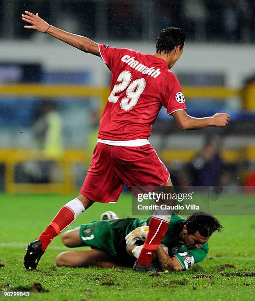 Gianluigi Buffon of Juventus FC saves at the feet of Marouane Chamakh of Bordeaux during the UEFA Champions League Group A match between Juventus FC...