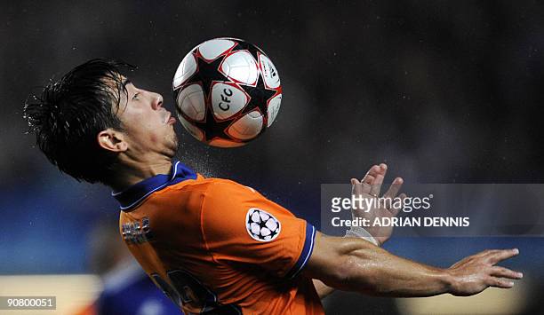 Porto's Fucile keeps his eye on the ball against Chelsea during the Champions League Group D football match at Stamford Bridge in London on September...