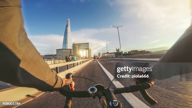 pov bicycle riding: commuter with road racing bike in london - go pro camera imagens e fotografias de stock