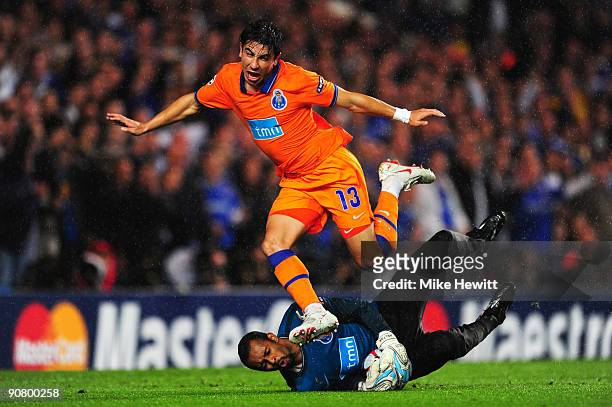 Fucile of Porto collides with his own goalkeeper, Helton of Porto during the UEFA Champions League Group D match between Chelsea and FC Porto at...
