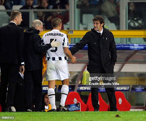 Head coach Ciro Ferrara of Juventus acknowledges Fabio Cannavaro as he leaves the pitch during the UEFA Champions League Group A match between...