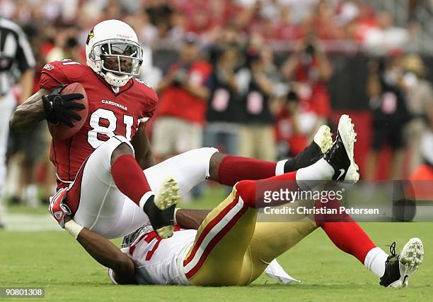 Wide receiver Anquan Boldin of the Arizona Cardinals is tackled after a reception during the football against the San Francisco 49ers during the NFL...
