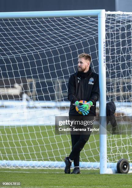 Goalkeeper Rob Elliot stands against the goal posts during the Newcastle United Training session at the Newcastle United Training Centre on January...