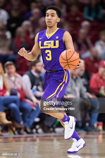 Tremont Waters of the LSU Tigers dribbles down the court during a game against the Arkansas Razorbacks at Bud Walton Arena on January 10, 2018 in...