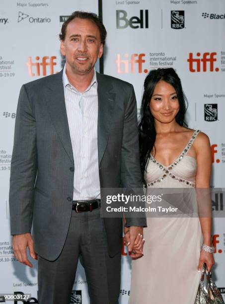 Actor Nicolas Cage and wife Alice Kim Cage arrive at the "Bad Lieutenant: Port Of Call New Orleans" screening held at the Ryerson Theatre on...