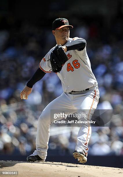 Jeremy Guthrie of the Baltimore Orioles delivers to the plate in the first inning of a game against of the New York Yankees at Yankee Stadium on...