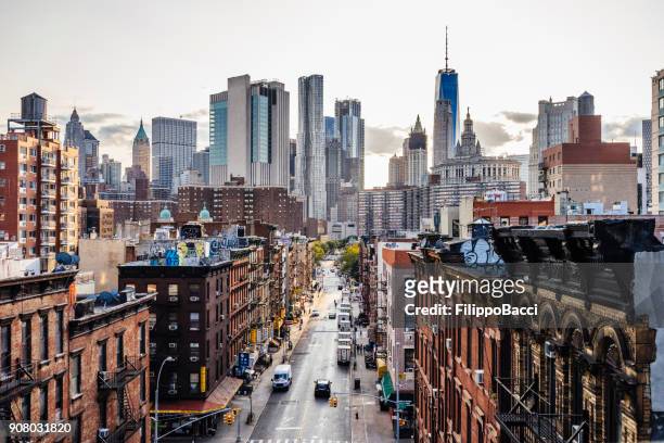 lower manhattan cityscape - chinatown - high street stock pictures, royalty-free photos & images