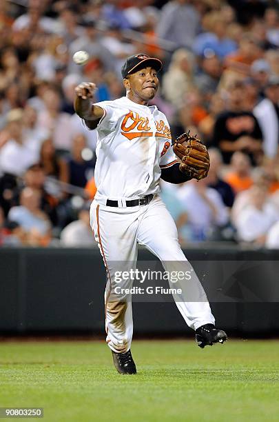 Melvin Mora of the Baltimore Orioles throws the ball to first base against the New York Yankees at Camden Yards on September 1, 2009 in Baltimore,...