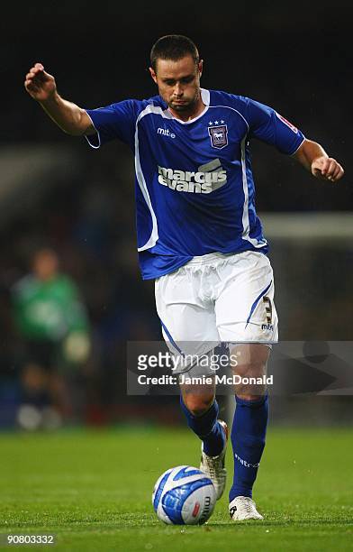 Damien Delaney of Ipswich Town runs with the ball during the Coca Cola Championship match between Ipswich Town and Nottingham Forest at Portman Road...