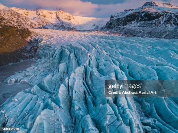 crevices at svinafellsjokull glacier, iceland - ghiacciai foto e immagini stock