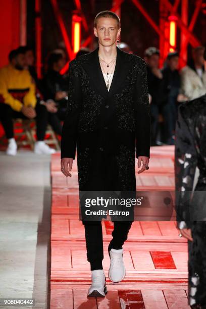 Model walks the runway during the Alexander McQueen Menswear Fall/Winter 2018-2019 show as part of Paris Fashion Week on January 19, 2018 in Paris,...