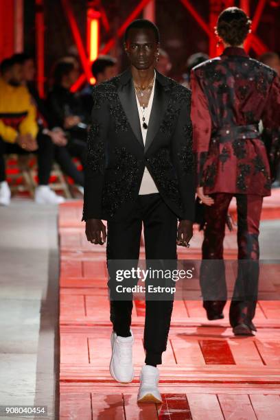 Model walks the runway during the Alexander McQueen Menswear Fall/Winter 2018-2019 show as part of Paris Fashion Week on January 19, 2018 in Paris,...