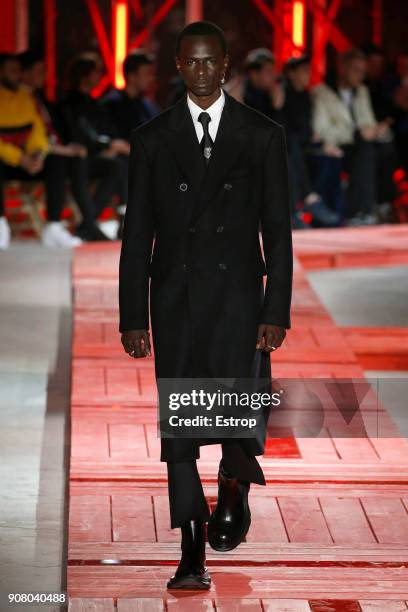 Model walks the runway during the Alexander McQueen Menswear Fall/Winter 2018-2019 show as part of Paris Fashion Week on January 19, 2018 in Paris,...