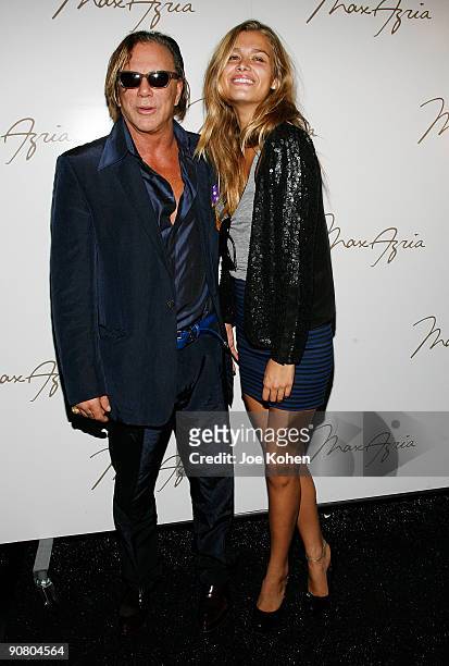 Actor Mickey Rourke and model Cheyenne Tozzi attend Max Azria Spring 2010 during Mercedes-Benz Fashion Week at Bryant Park on September 15, 2009 in...