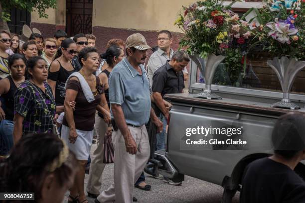 Funeral Procession for a murdered youth in El Salvador. Ilopango is a town in the San Salvador department of El Salvador. It is a few miles east of...