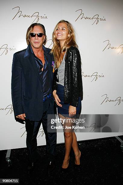 Actor Mickey Rourke and model Cheyenne Tozzi attend Max Azria Spring 2010 during Mercedes-Benz Fashion Week at Bryant Park on September 15, 2009 in...