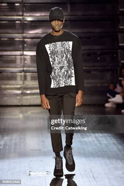 Model walks the runway at the White Mountaineering Autumn Winter 2018 fashion show during Paris Menswear Fashion Week on January 20, 2018 in Paris,...