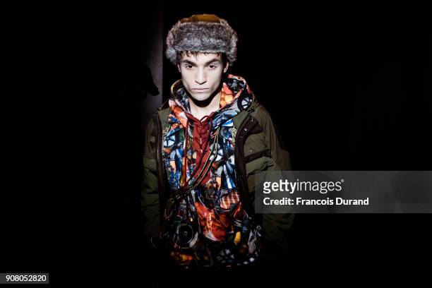 Model poses Backstage prior the White Mountaineering Menswear Fall/Winter 2018-2019 Presentation as part of Paris Fashion Week on January 20, 2018 in...