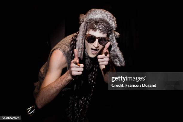 Model poses Backstage prior the White Mountaineering Menswear Fall/Winter 2018-2019 Presentation as part of Paris Fashion Week on January 20, 2018 in...