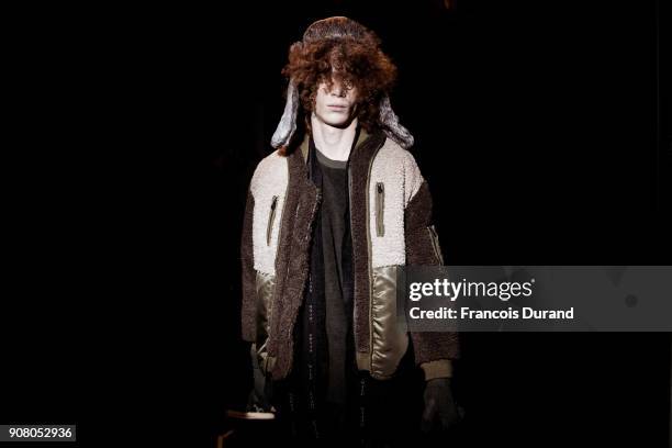 Model poses Backstage prior the White Mountaineering Menswear Fall/Winter 2018-2019 Presentation as part of Paris Fashion Week on January 20, 2018 in...