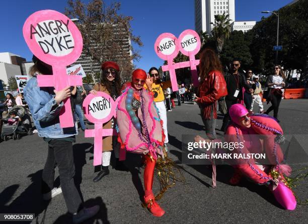 Protesters, part of a 500,000 strong crowd, attend the Women's Rally on the one-year anniversary of the first Women's March in Los Angeles,...