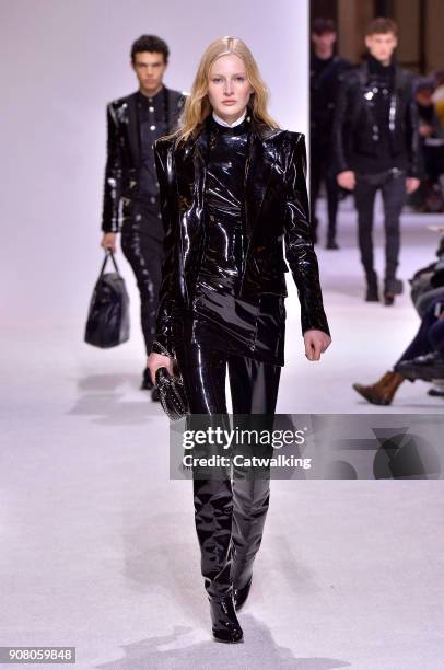 Model walks the runway at the Balmain Homme Autumn Winter 2018 fashion show during Paris Menswear Fashion Week on January 20, 2018 in Paris, France.