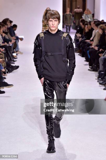 Model walks the runway at the Balmain Homme Autumn Winter 2018 fashion show during Paris Menswear Fashion Week on January 20, 2018 in Paris, France.