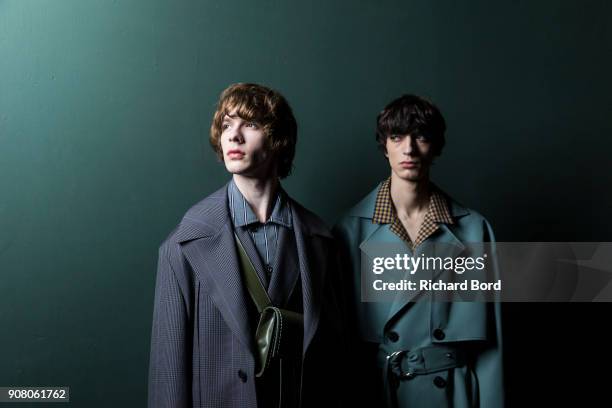 Models pose backstage prior the Wooyoungmi Menswear Fall/Winter 2018-2019 show as part of Paris Fashion Week on January 20, 2018 in Paris, France.