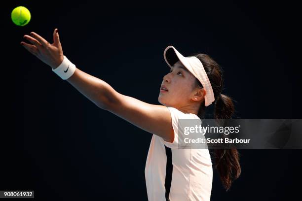 Xinyu Wang of China serves against Sakura Hosogi of Japan during the Australian Open 2018 Junior Championships at Melbourne Park on January 21, 2018...