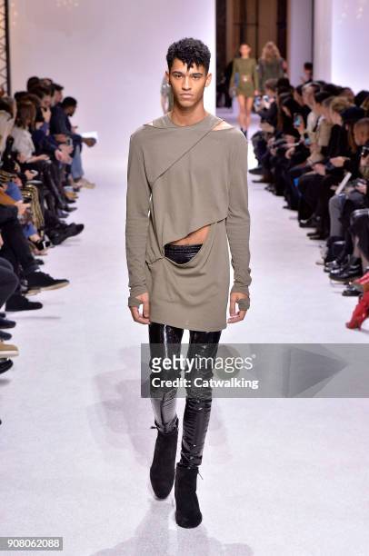Model walks the runway at the Balmain Homme Autumn Winter 2018 fashion show during Paris Menswear Fashion Week on January 20, 2018 in Paris, France.