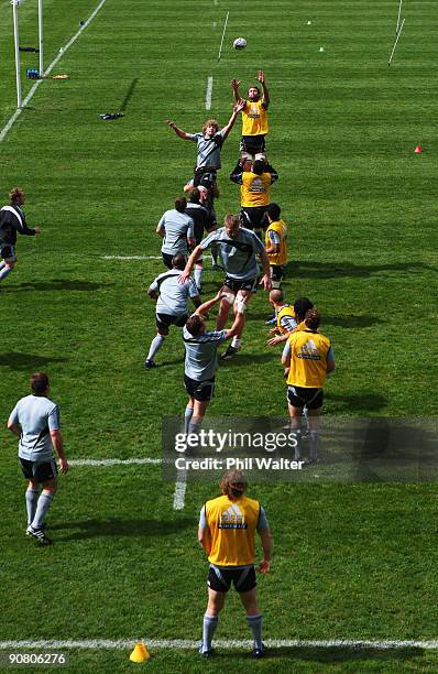 Jason Eaton and Adam Thomson of the All Blacks practice the lineout during a New Zealand All Blacks skills session at Rugby League Park on September...