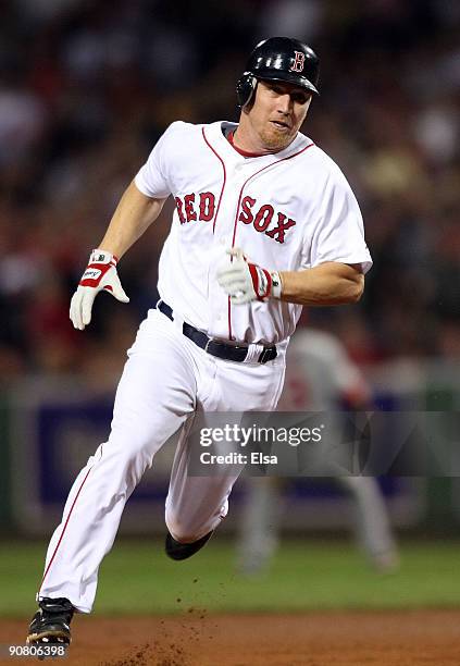 Drew of the Boston Red Sox run the bases on his triple in the eighth inning against the Los Angeles Angels of Anaheim on September 15, 2009 at Fenway...