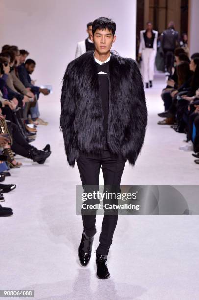 Model walks the runway at the Balmain Homme Autumn Winter 2018 fashion show during Paris Menswear Fashion Week on January 20, 2018 in Paris, France.