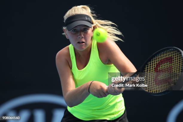 Amber Marshall of Australia plays a backhand against Qinwen Zheng of China during the Australian Open 2018 Junior Championships at Melbourne Park on...