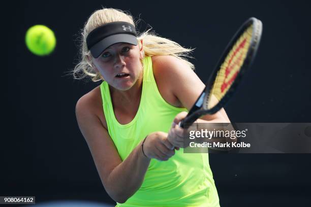 Amber Marshall of Australia plays a backhand against Qinwen Zheng of China during the Australian Open 2018 Junior Championships at Melbourne Park on...